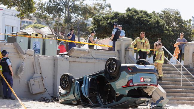 The car was roped off by fire crews. Photo: Tim Pascoe