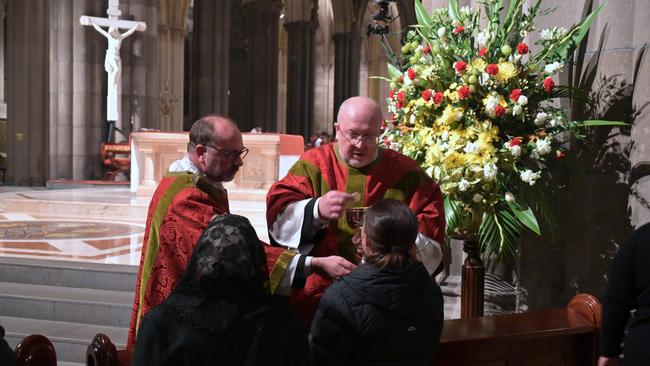 Communion is given at the final Latin mass.