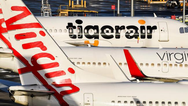 Planes sit idle on the tarmac at Melbourne Airport. Picture: AFP