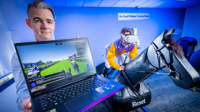 La Trobe University’s Associate Professor Brad Wright with jockey Will Price. Picture: Jake Nowakowski