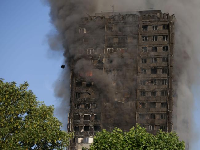 Dogs will be sent in to search the building as firefighters work to structurally support it. Picture: AFP PHOTO / Daniel LEAL-OLIVAS