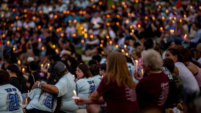 Families participate in a candlelight vigil dedicated to the 19 children and two adults murdered during the mass shooting at Robb Elementary School. Picture: Brandon Bell/Getty Images/AFP