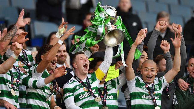 Celtic celebrate winning consecutive Scottish League Cups. (Photo by Mark Runnacles/Getty Images)