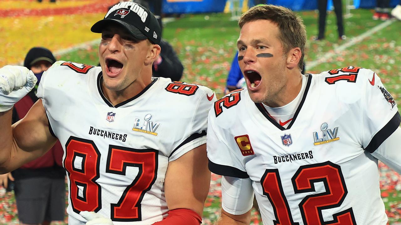 Tom Brady and Rob Gronkowski celebrate after winning the Super Bowl against Kansas City. (Photo by Mike Ehrmann/Getty Images)