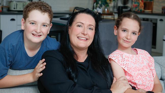 Elisha Salkeld with daughter Sophie and son Hunter 12 happy to have found a better health insurance option .Picture: Glenn Campbell