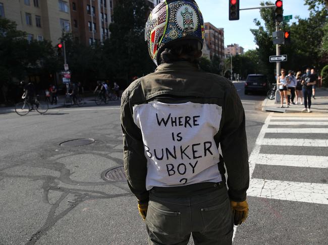 A demonstrator wearing a helmet stands in the road during a protest against police brutality and the death of George Floyd in Washington, DC. Picture: Getty Images/AFP