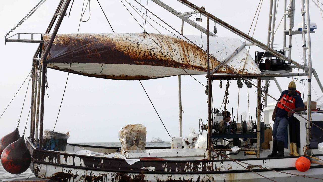 Local fishers are being strongarmed by cartels to sell them their hauls, according to the report. Picture: AP Photo/Gerald Herbert