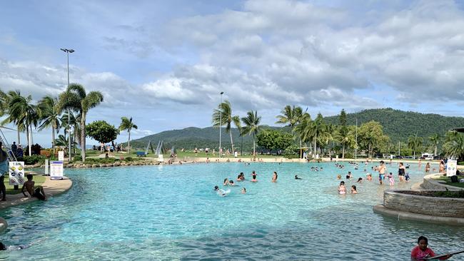 The Airlie Beach Lagoon is packed with families on New Year's Eve 2021. Picture: Rae Wilson