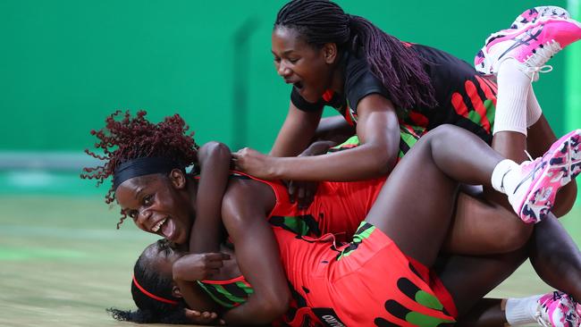 Malawi celebrate their stunning victory over New Zealand.