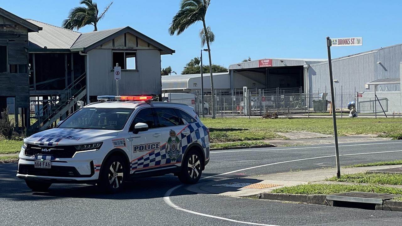 Police were directing traffic away from Brooks St where all the emergency vehicles were parked. Picture: Janessa Ekert