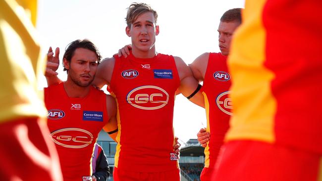 Tom Lynch address his teammates before a game.