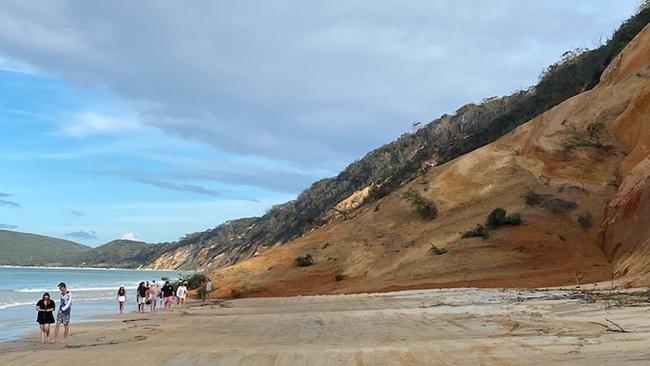 Landslide cleared at Qld tourist beach after 70m+ cliff collapses