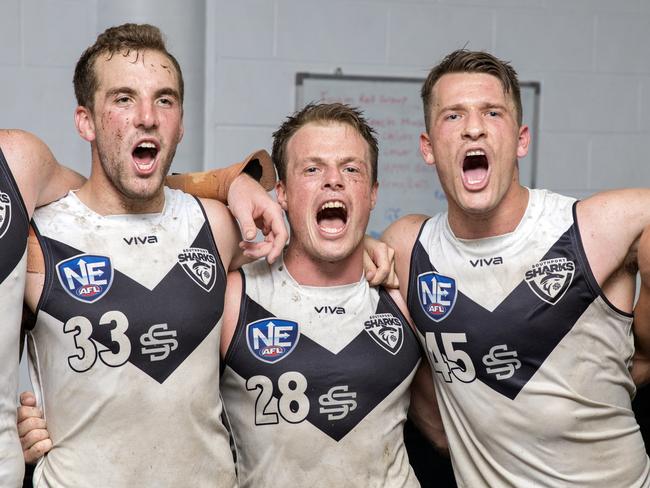 Matt Doran, Robert Clements and Ethan Reeves celebrate after beating Aspley in the NEAFL semi-final at Fankhauser Reserve on Saturday, September 8, 2018. Picture credit: TJ Yelds.