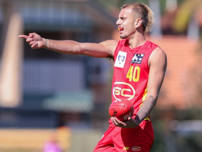 Gold Coast’s Joel Jeffrey points to the man on the mark during the VFL round 15 clash against Aspley at Graham Road Oval. Former Wanderers star Jeffrey kicked a stunning nine goals in his team’s big win. Picture: Russell Freeman/AFL Photos via Getty Images