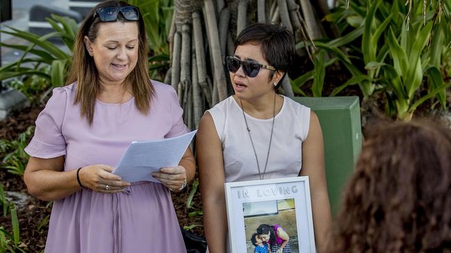 Friends and work colleagues laying flowers at Surfers Paradise Beach for Gold Coast nurse Ravneet Kaur. Picture: Jerad Williams