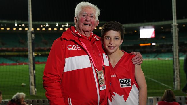 Clovelly's Edyn Harapin, a rising AFL star with his famous Swans supporter grandad Kenny Williams at the Swans V Hawthorn match at the SCG. Picture: Danny Aarons.