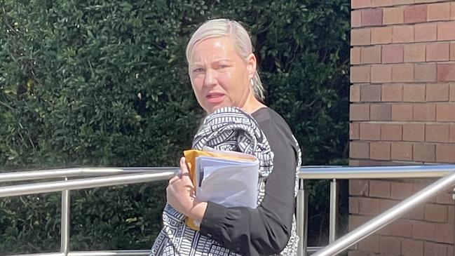 Former police prosecutor Kristy Lea Madden, 46, of Toronto, leaving Belmont Local Court after facing charges including breaching an AVO and being armed with intent to commit an offence. Picture: NewsLocal