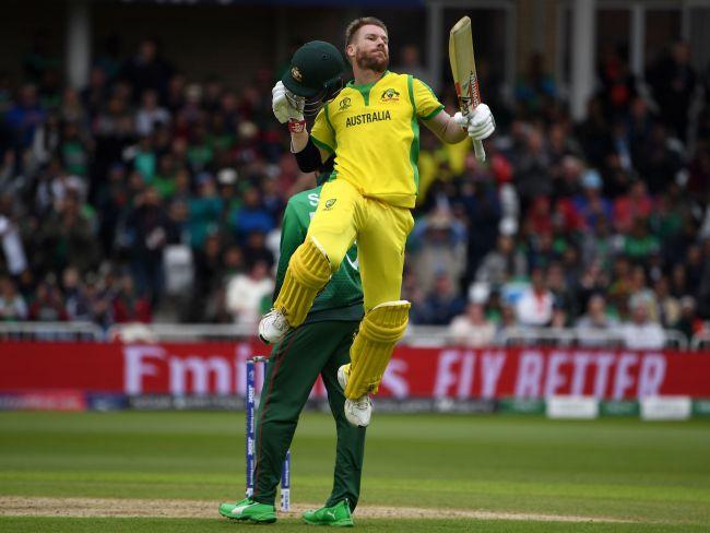 David Warner celebrates his century.