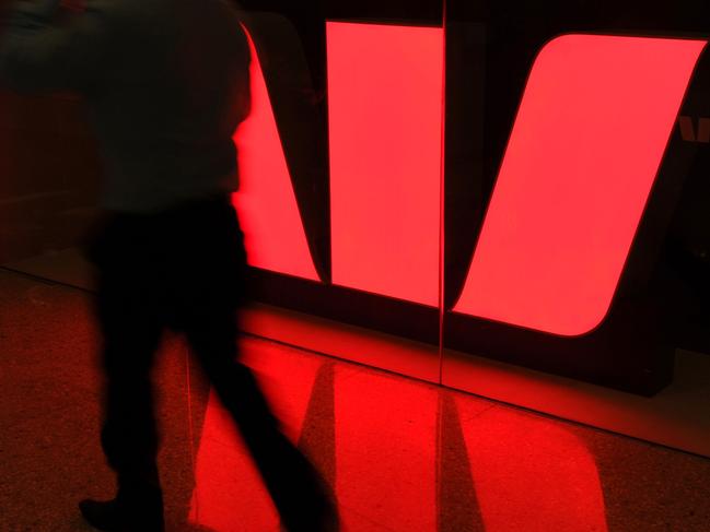 The Westpac Bank logo is reflected on the floor of a shopping centre in Sydney, 28/07/2011.