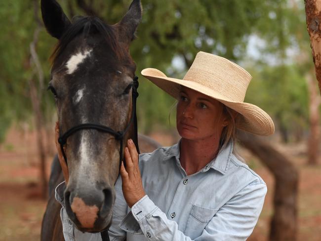 Trainer Bec Klingenberg on her property in Katherine east after someone set fire to all her belongings. Picture: Amanda Parkinson