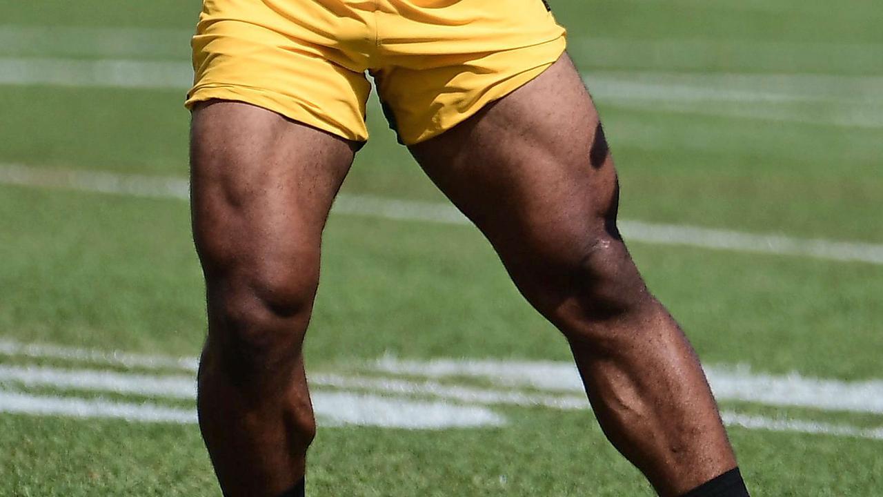 AJ Dillon’s legs are... well... huge. Stacy Revere/Getty Images/AFP