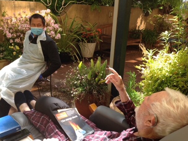 Mike Jenkinson chats with his son Daniel Jenkinson in the Whittle Ward courtyard. Picture: Libby Jenkinson