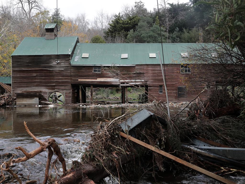 Flood water rushed past an old structure on Glen Dhu Road in Molesworth. Picture: JOANNE YOUNG