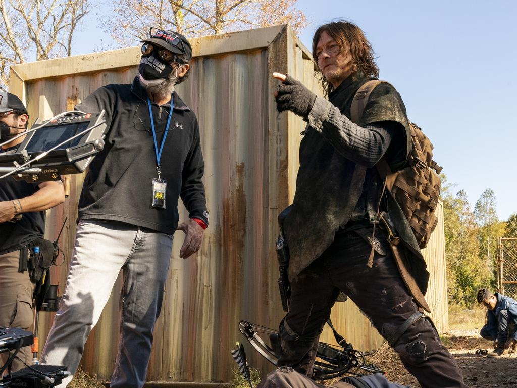 Zombie virus ... no, it’s Norman Reedus and Covid-masked crew behind the scenes.