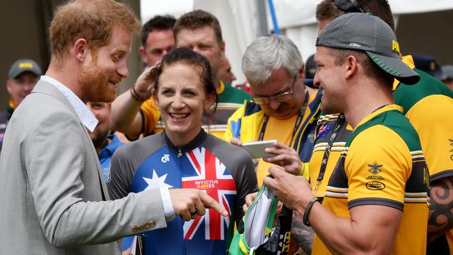 Ben Yeomans presented Harry with a pair budgie smugglers to sign. Picture: Jonathan Ng