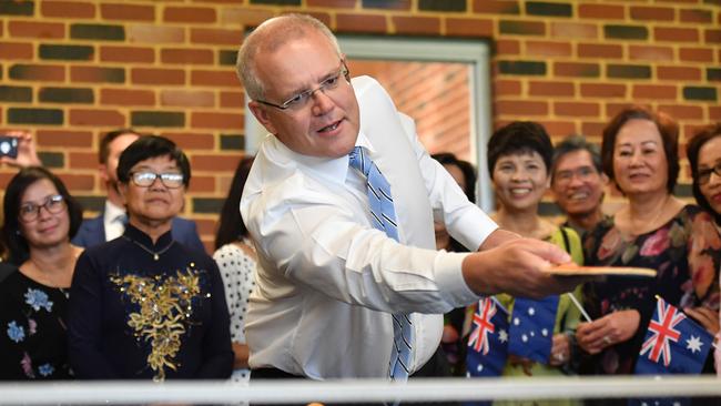 Prime Minister Scott Morrison playing table tennis at a multicultural event at suburban Koondoola, north of Perth, yesterday. Picture: AAP