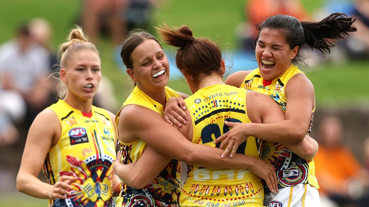 Adelaide's Lisa Whiteley celebrates a goal with teammates during the win over the Giants. Picture: Phil Hillyard