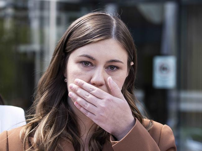 CANBERRA, AUSTRALIA NewsWire Photos OCTOBER 27, 2022:An upset Brittany Higgins with her partner David Sharaz left the Magistrates Court in Canberra. Her mum Kelly Higgins was with her.Picture: NCA NewsWire / Gary Ramage