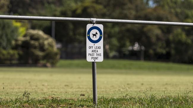 Signs alert visitors of Gracedale Park’s dog off lead area. Photo: Daniel Pockett