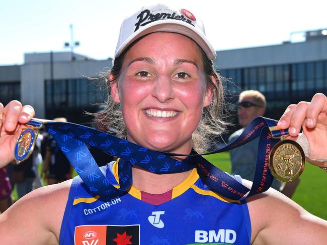 MELBOURNE, AUSTRALIA - DECEMBER 03: Breanna Koenen of the Lions poses with the best on ground medal following the AFLW Grand Final match between North Melbourne Tasmania Kangaroos and Brisbane Lions at Ikon Park, on December 03, 2023, in Melbourne, Australia. (Photo by Morgan Hancock/AFL Photos)