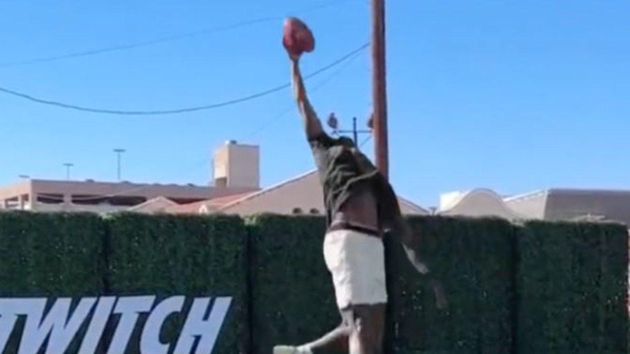 DK Metcalf leaps into the air.