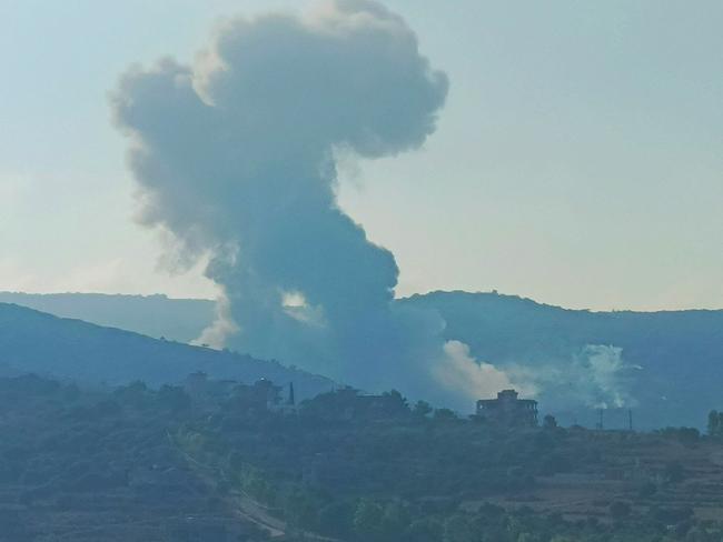 Smoke billows from an area targeted by an Israeli airstrike between the southern Lebanese border villages of Zibqin and Yater. Picture: AFP