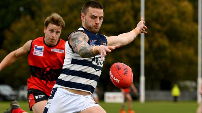 Jason Cooke of Macedon kicks during the round 16 Riddell District Football Netball League 2023 Bendigo Bank Seniors match between Romsey and Macedon at Romsey Park in Romsey, Victoria on August 5, 2023. (Photo by Josh Chadwick)