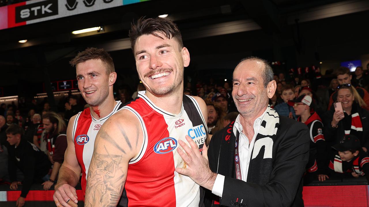 MELBOURNE, AUSTRALIA - JULY 07: Andrew Bassat, President of St Kilda Football Club celebrates with Josh Battle of the Saints during the round 17 AFL match between St Kilda Saints and Sydney Swans at Marvel Stadium, on July 07, 2024, in Melbourne, Australia. (Photo by Kelly Defina/Getty Images)