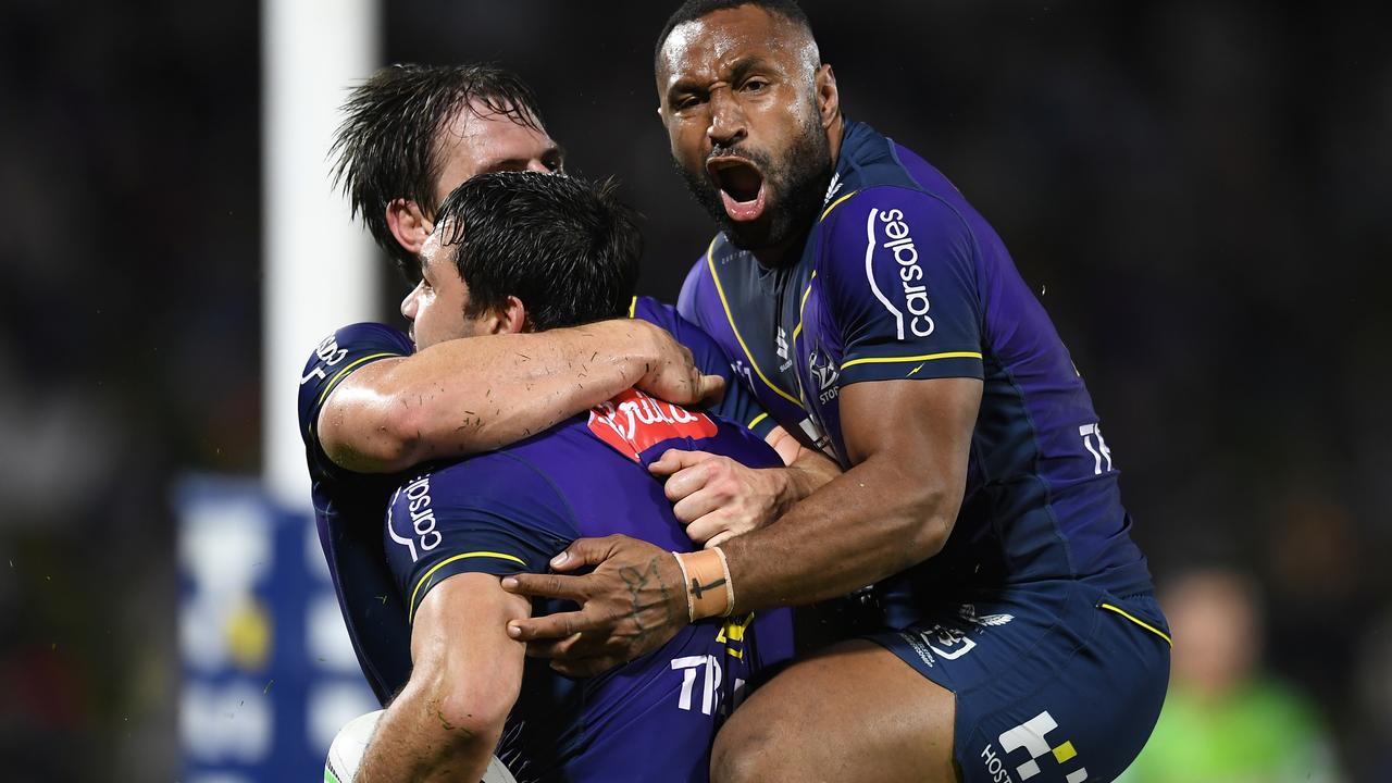 SUNSHINE COAST, AUSTRALIA - AUGUST 12: Brandon Smith of the Storm celebrates with team mates after scoring a try during the round 22 NRL match between the Melbourne Storm and the Canberra Raiders at Sunshine Coast Stadium, on August 12, 2021, in Sunshine Coast, Australia. (Photo by Albert Perez/Getty Images)