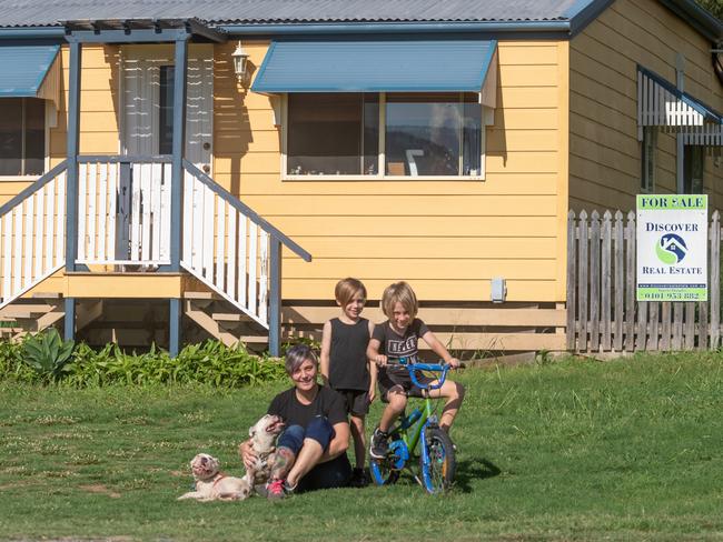 Mum, Colleen Hehir with her two sons Reilly Norman aged 9 years, and Arden Norman aged 6 years at their house at 23 Black Street, Mt Morgan.Picture Steve Vit