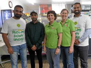 NO DIVIDE: Muslims Down Under members Ali Basil, Salman Mansoor and Sheeraz Sirajur Raheem with Justine Halpin and Beth Boorer from Take Tthe Plunge Cafe at Kepnock. Picture: Rhylea Millar