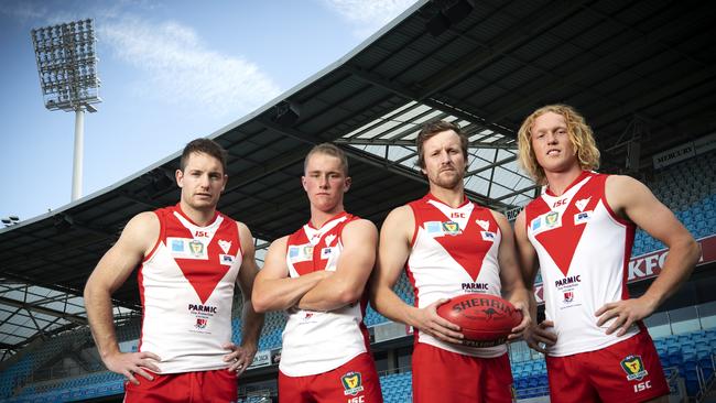 Clarence footballers (L-R) Captain Brady Jones, Jack Preshaw, Coach Jeromey Webberley and Ethan Jackson at Blundstone Arena. Picture: CHRIS KIDD