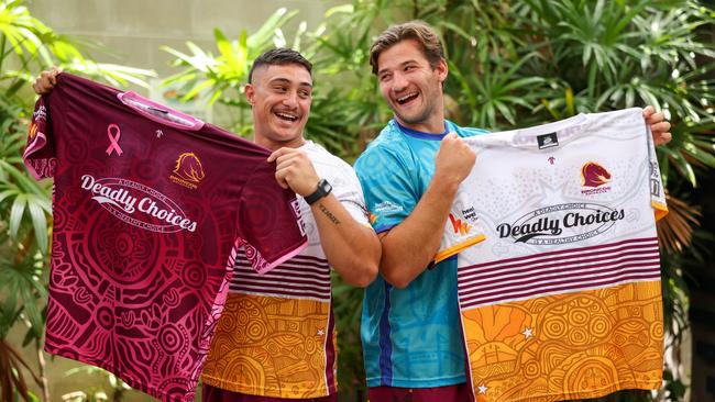 Broncos players Kotoni Staggs and Patrick Carrigan with the new Deadly Choices jersey. Picture: Peter Wallis