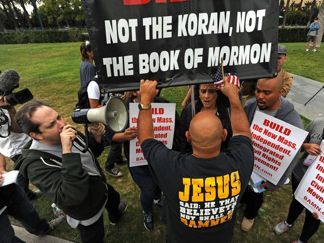 Protesters face-off outside a Donald Trump rally at the Anaheim Convention Centre. Picture: AFP