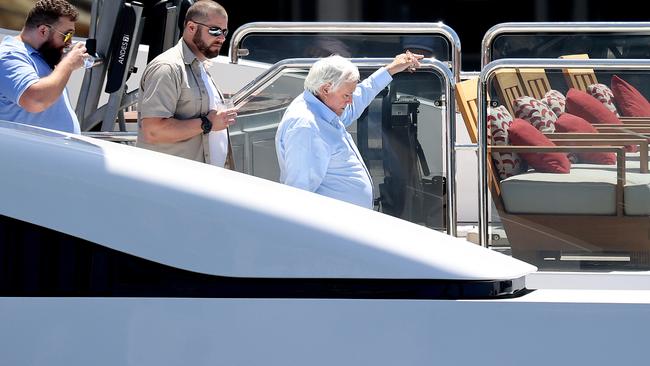 Clive Palmer and guests aboard Australia, on Sydney Harbour earlier this year.