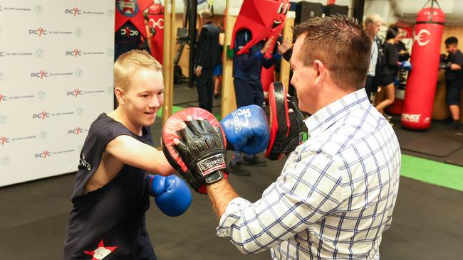 Lachlan Feher-hegarty boxing with NSW Deputy Premier Paul Toole at Parramatta PCYC on Tuesday morning.