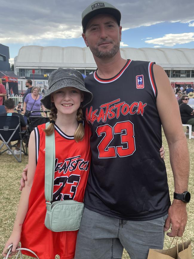 Shepparton's Addison Lines with dad Daryl had a fun time at Meatstock 2023 at the Melbourne Showgrounds, decked out in the official basketball singlets.