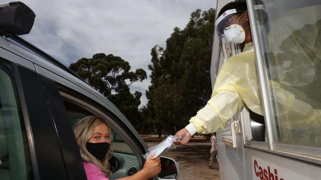 Some pharmacies have a drive-through option for those picking up rapid antigen tests. Picture: Emma Brasier