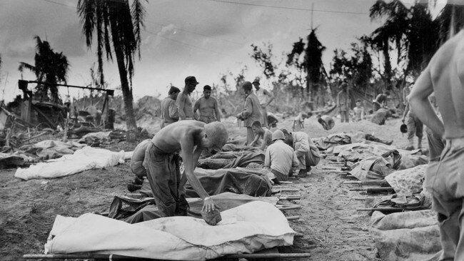 The bodies of American soldiers killed during the Pacific campaign of World War II on the beach in Palau. Picture: US Coast Guard/Getty Images