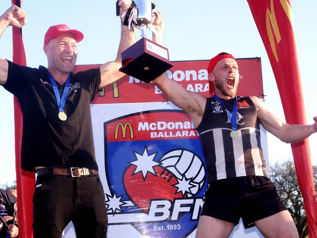 Ballarat FNL grand final: Darley v North Ballarat: Coach Dan Jordan and Captain Brett Bewley of Darley celebrate with the cup at City Oval on September 23, 2023 in Lake Wendouree, Australia.Picture: Hamish Blair